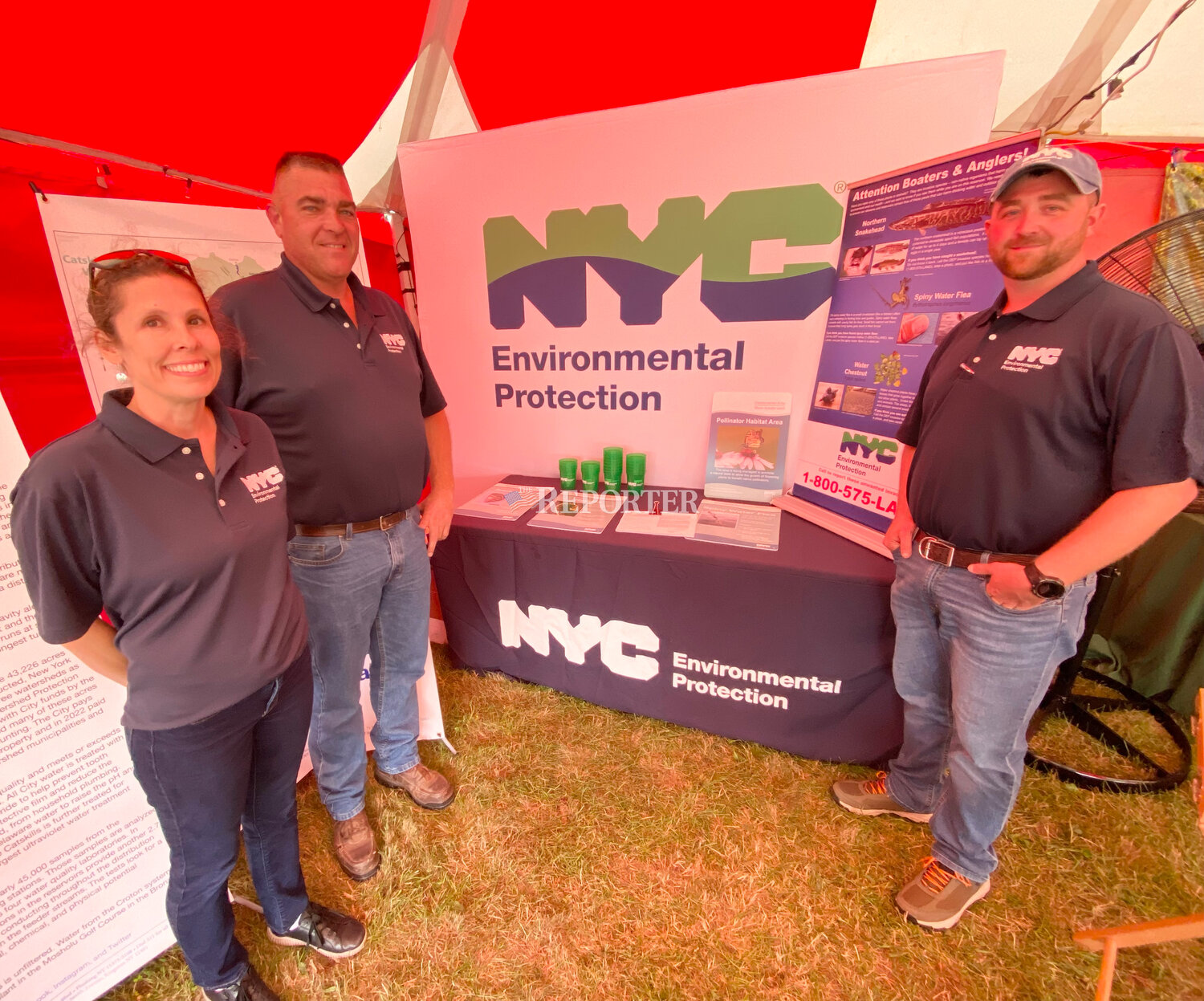 New York City Department of Environmental Protection staffers are at the Delaware County Fair assisting people with access permits to city-owned land and reservoirs for recreation. Pictured are Josh McGraw, Thomas Lamport and Sara Storrer.
